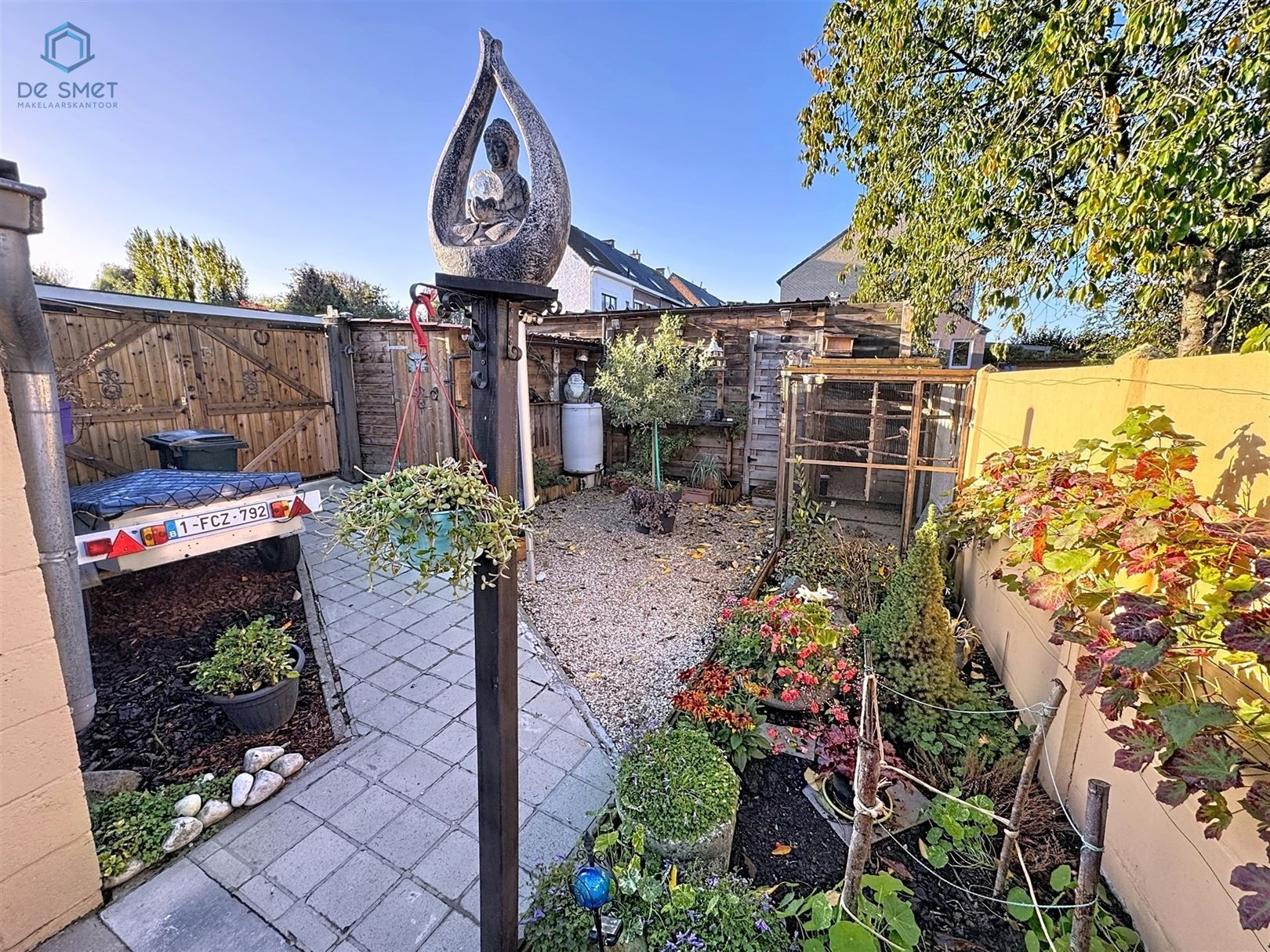 Instapklare woning met 3 slaapkamers, stadstuintje, berging en carport in rustige straat nabij centrum Brakel foto 12