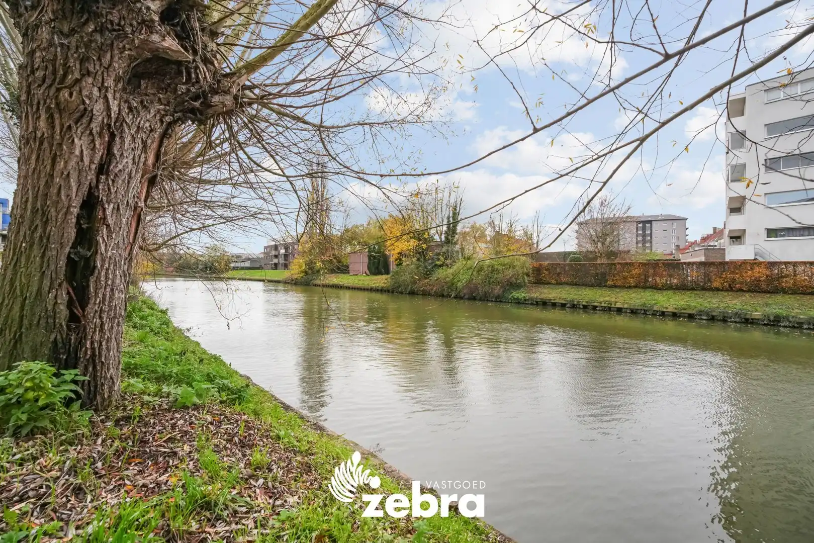 Moderne serviceflat met prachtig zicht op de Leie en autostaanplaats te Deinze! foto 25