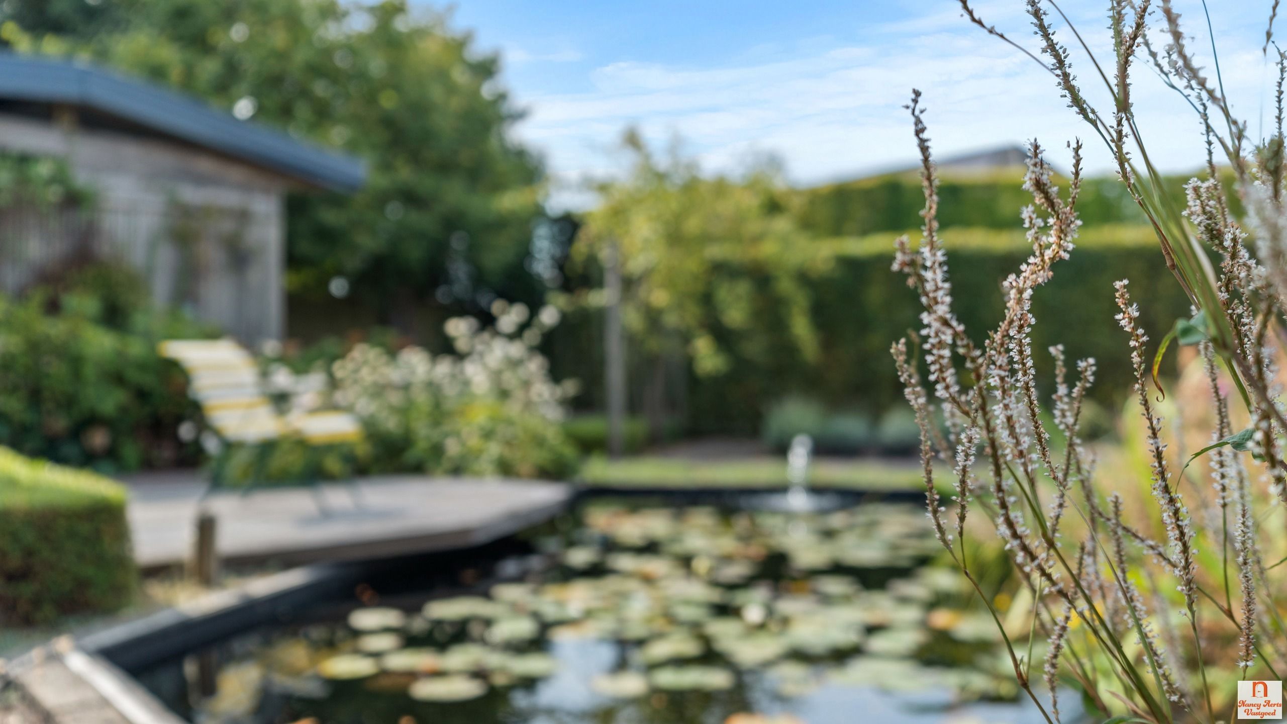 Instapklare woning met uitzonderlijk grote tuin met vijver foto 45