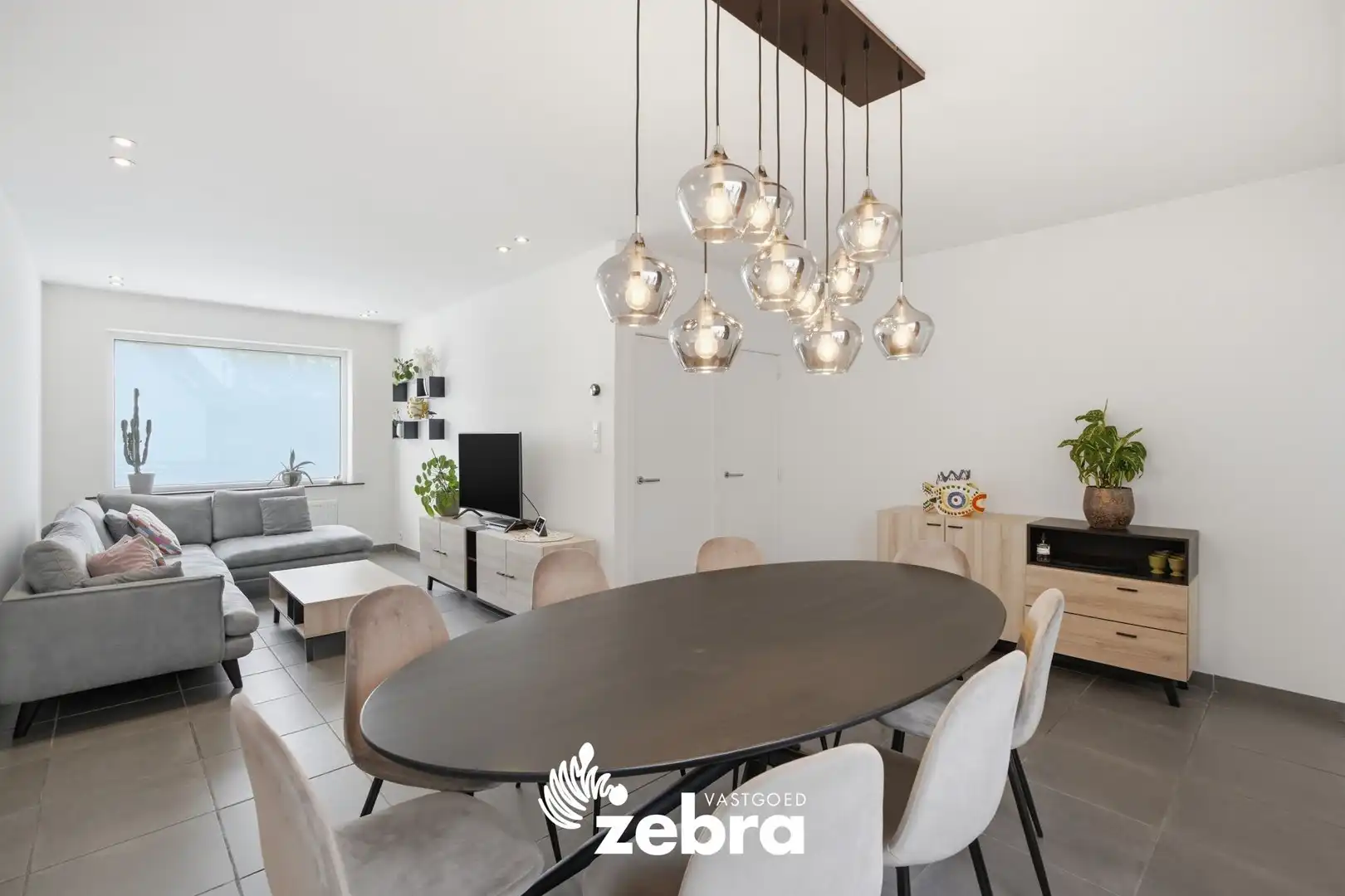 Instapklare gezinswoning met 3 slaapkamers en tuin in Waregem! foto {{pictureIndex}}
