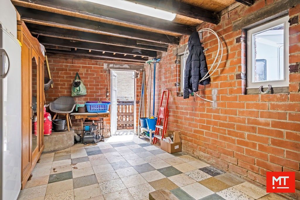 Halfopen woning in de dorpskern van Beselare foto 17