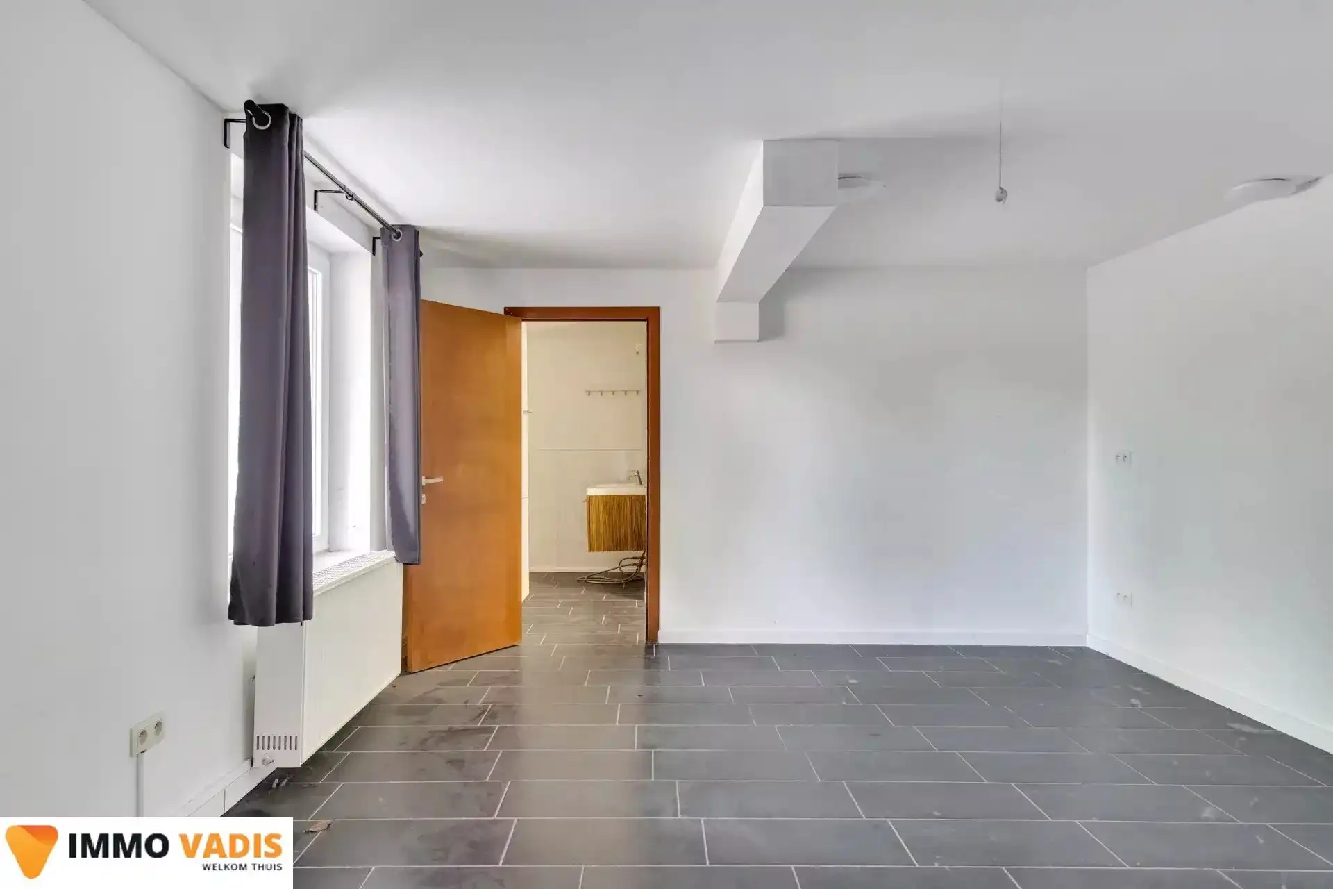 Ruim gelijkvloers appartement met  3 slaapkamers foto 12