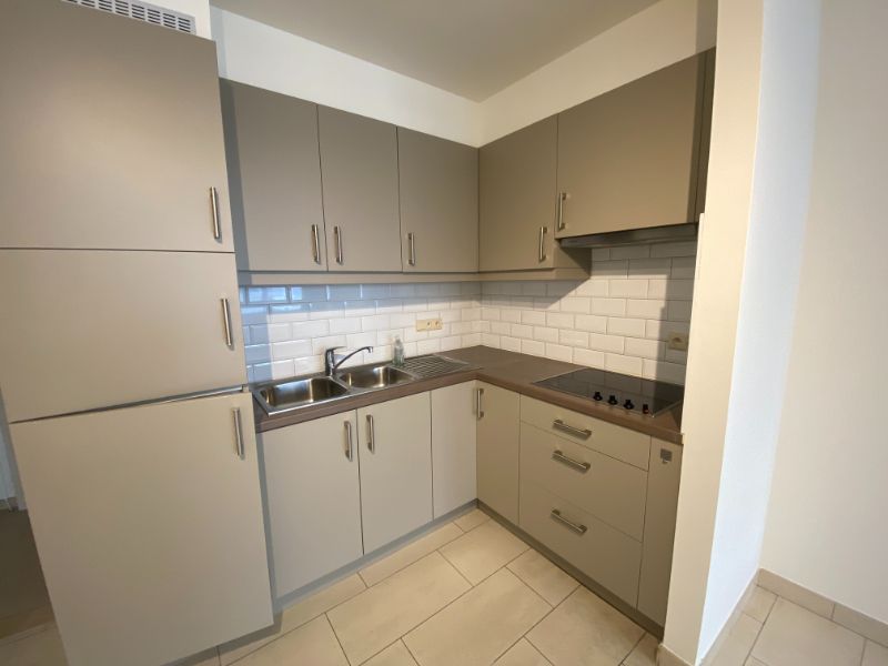 Gezellig gelijkvloers appartement (+-71m²) met autostaanplaats centrum Geel. foto 10