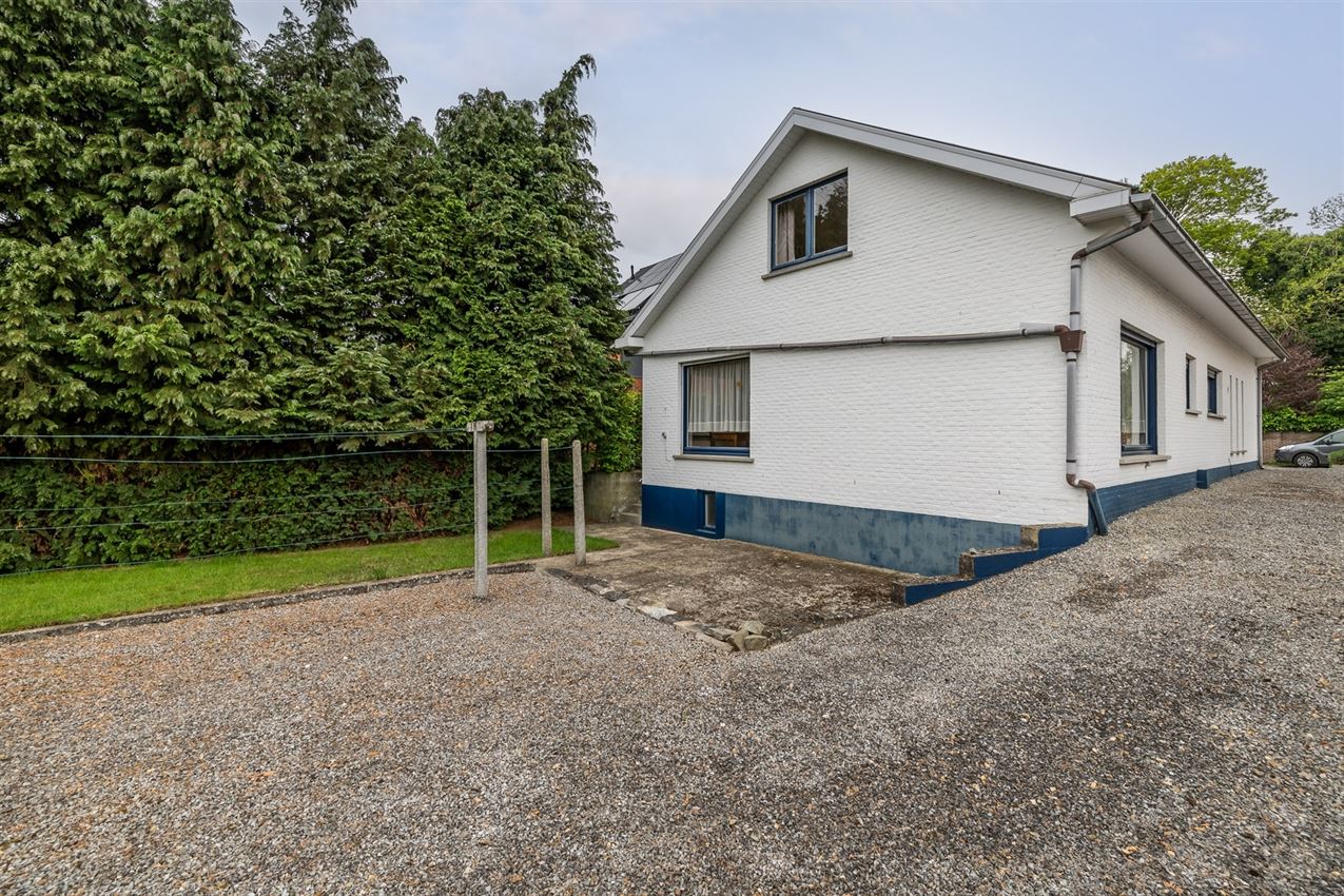 Te renoveren woning met 4 slk. in het hart van Averbode foto 34