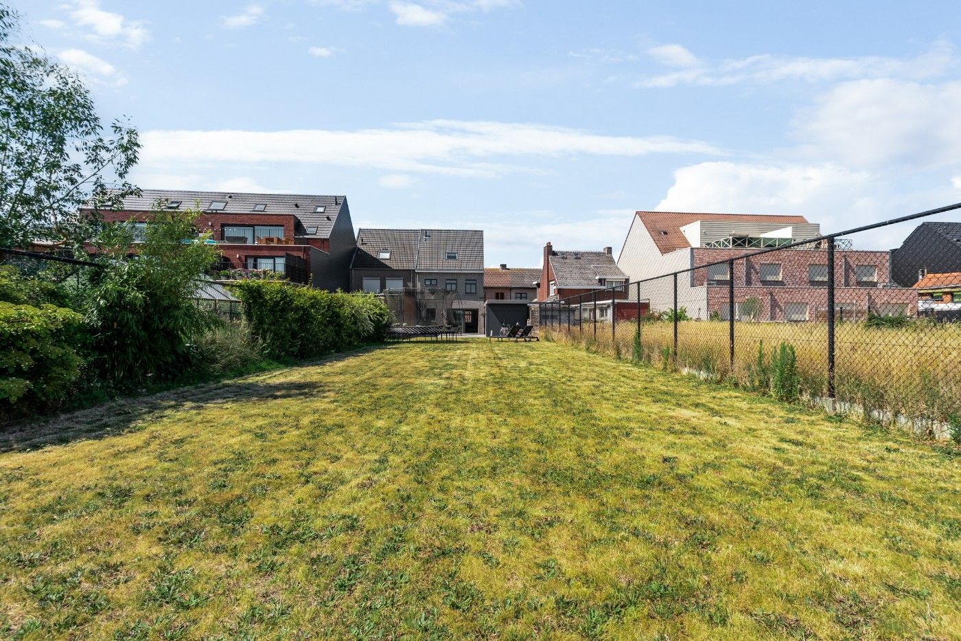 Ruime HOB met 3 slpk., tuin en carport foto 32