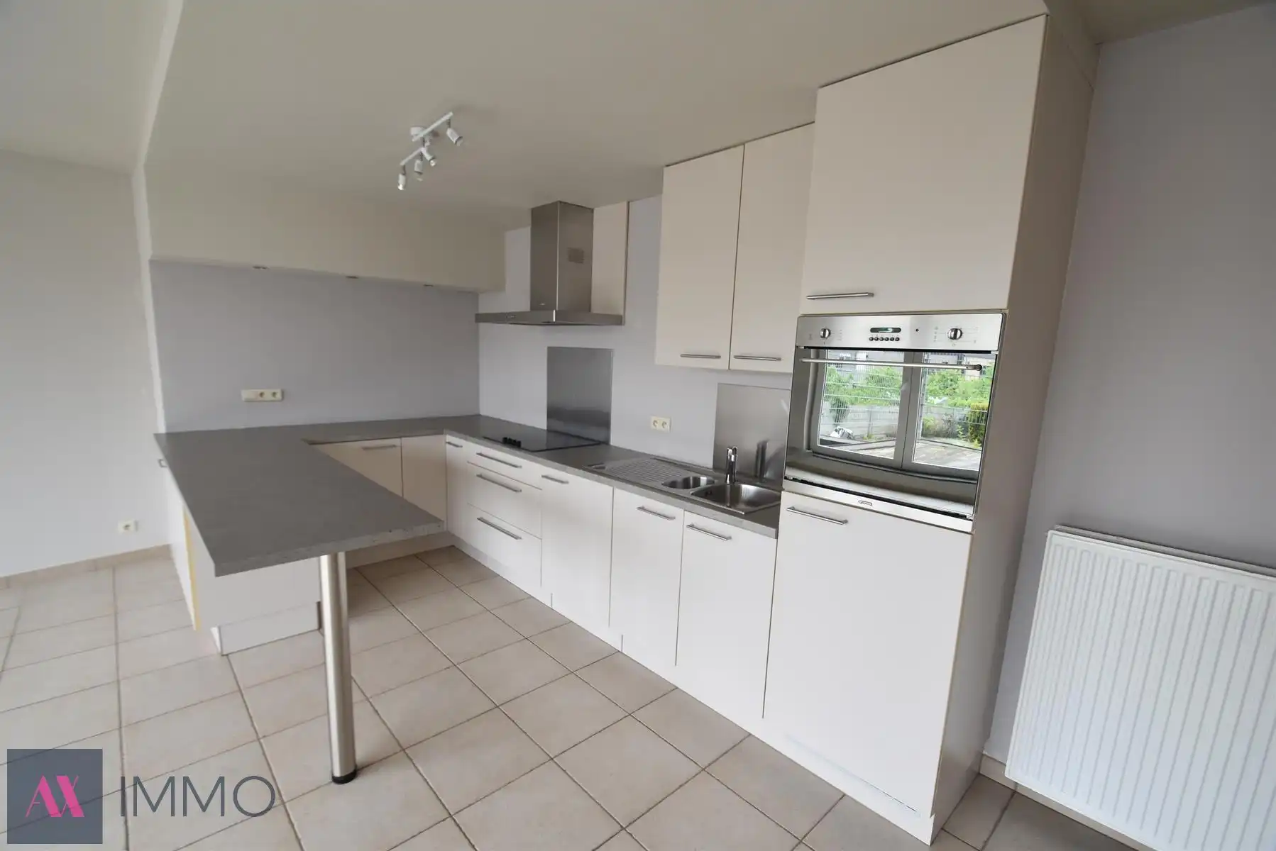 Centraal gelegen 1-slpk-apt met groot terras van 20 m², lift, vrij vanaf 01/12 foto 8