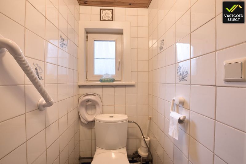 Te renoveren woning met tuin en garage in Sint-Laureins foto 12