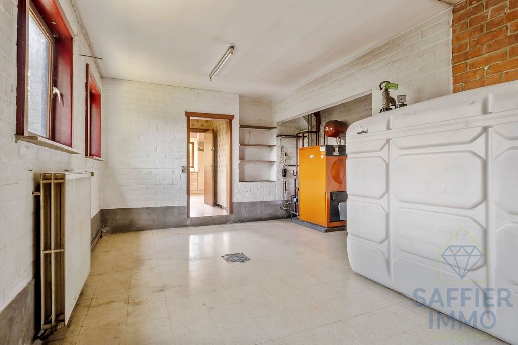 Ruime gezinswoning met zonnige tuin en 5 slaapkamers in hartje Izegem foto 23