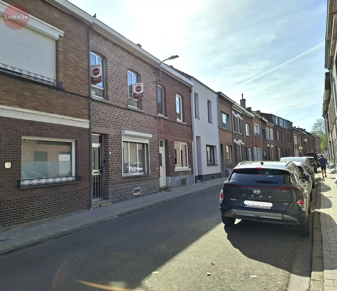 Goed gelegen woning // 2 slaapkamers + zolder om af te werken foto {{pictureIndex}}