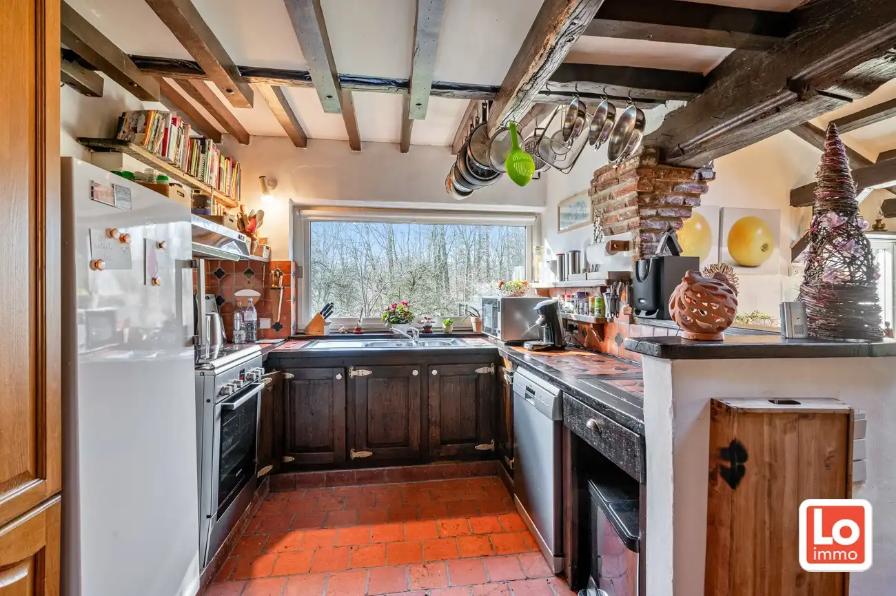 VERKOCHT! Charmante alleenstaande woning met inpandige dubbele garage en grote tuin met aanpalend bos (1ha) op een rustige locatie nabij het centrum van Wachtebeke! foto 10