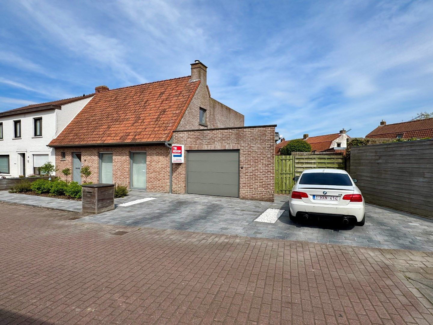 Hoofdfoto van de publicatie: INSTAPKLARE HALFOPEN WONING MET 4 SLPKS, TUIN EN GARAGE