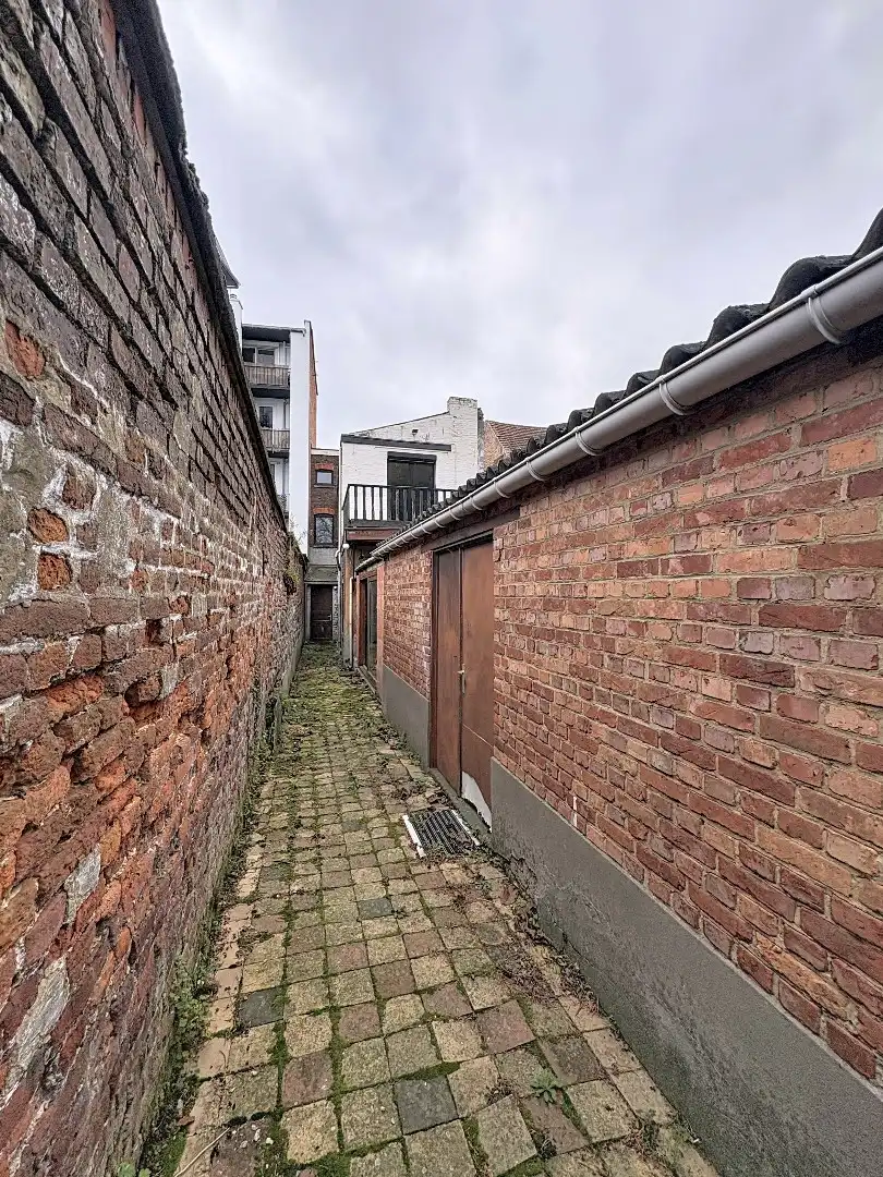 IN OPTIE! Charmant pand met handelsruimte en woonst in hartje Tienen foto 18