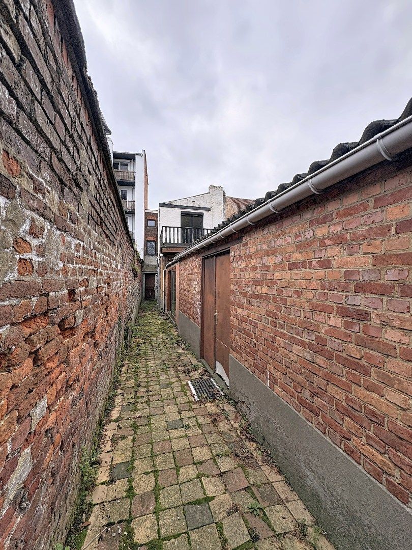 Charmant pand met handelsruimte en woonst in hartje Tienen foto 18