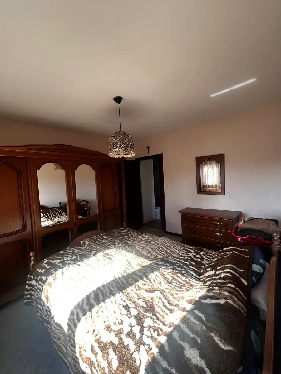 Ruime woning met 5 slpk, 2 badkamers, garage en ruime tuin foto 15