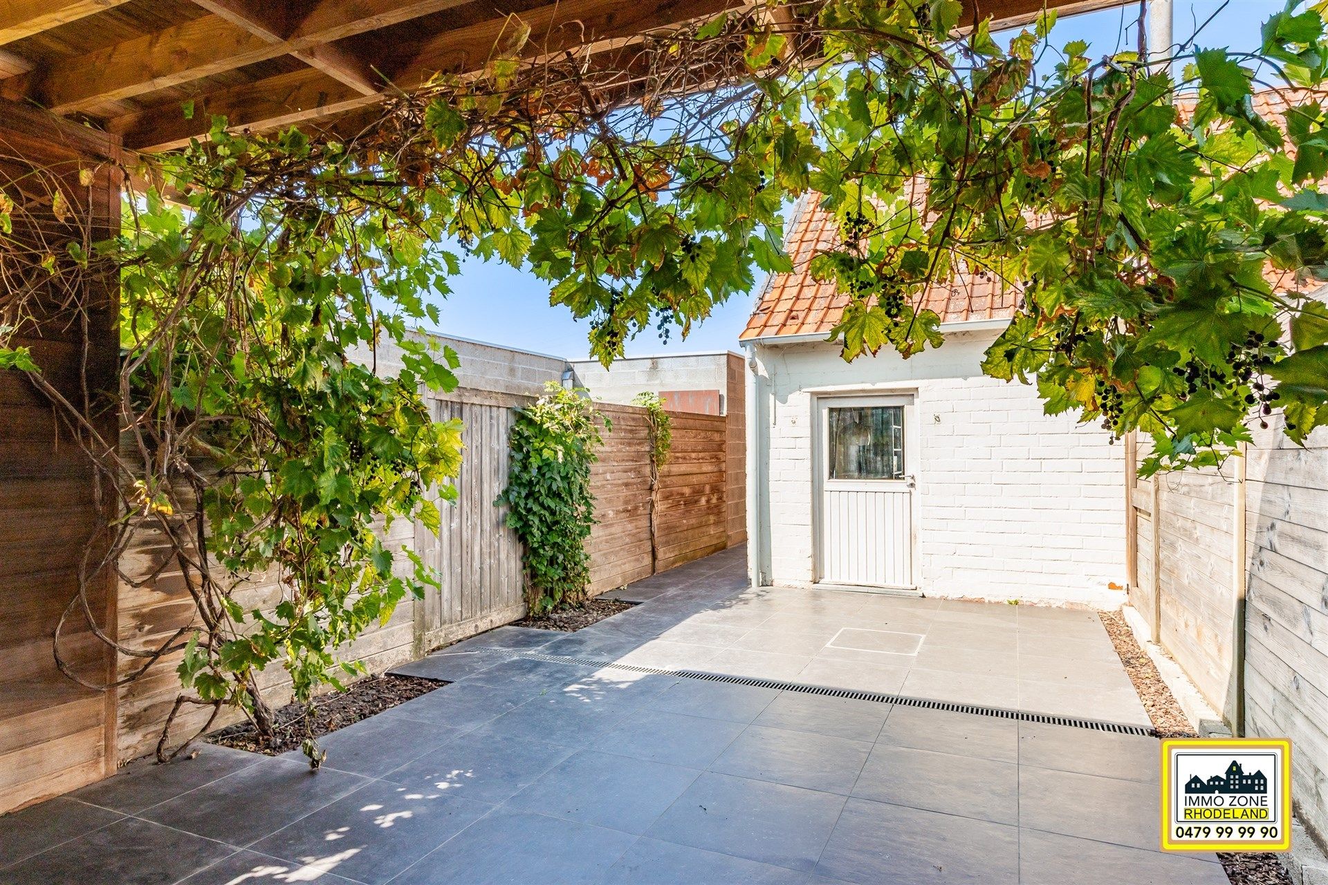 Instapklare woning met 2 slpks, garage en ruime tuin.  foto 22