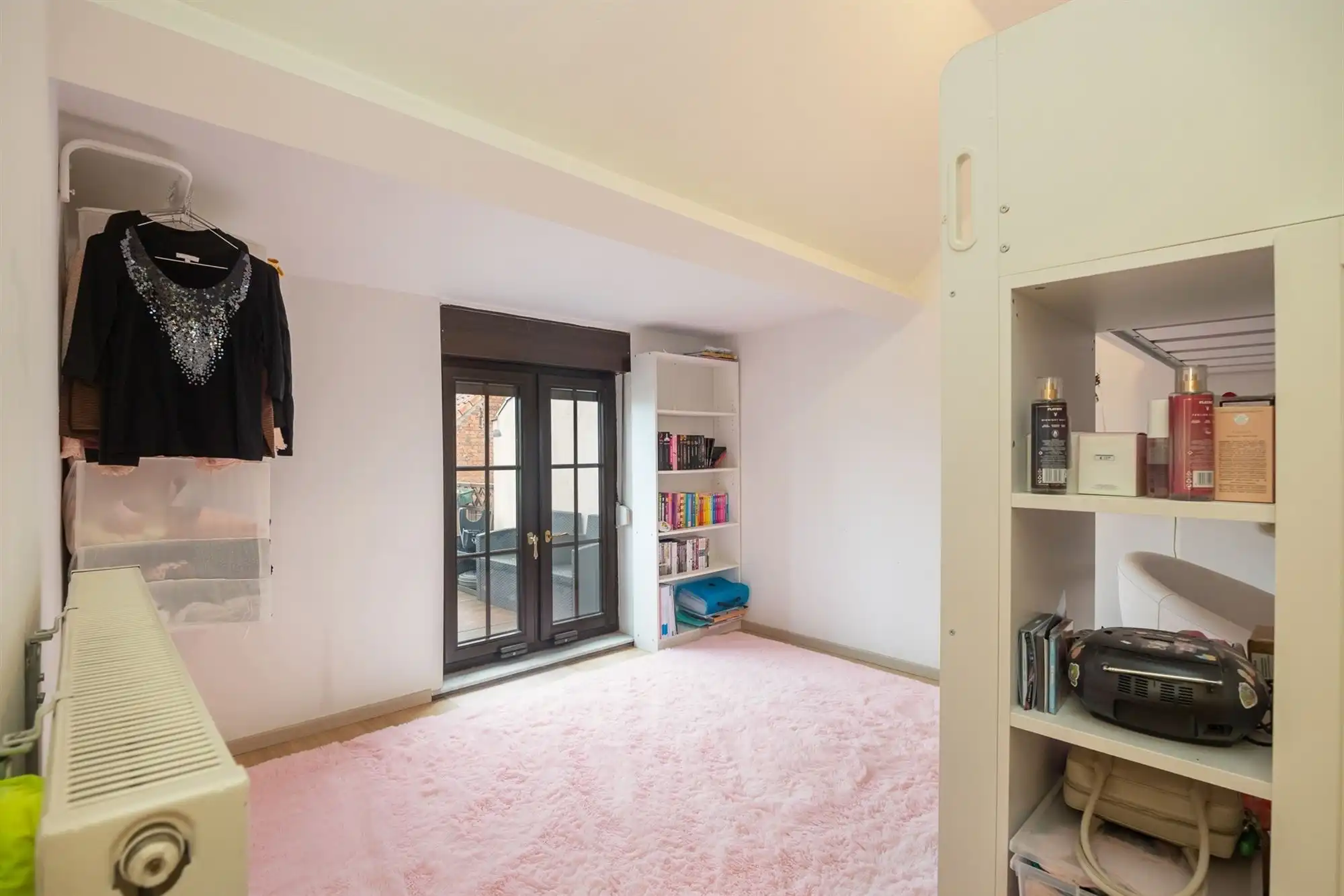 Instapklare woning met 2 à 3 slaapkamers en stadskoer foto 18