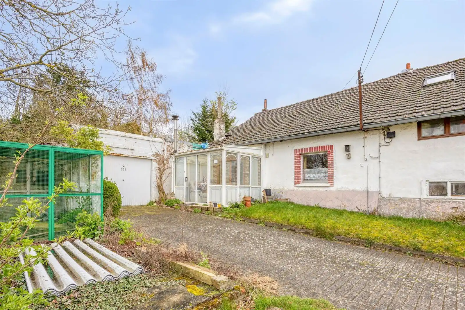 Twee- drigevelwoningen te renoveren. foto 3