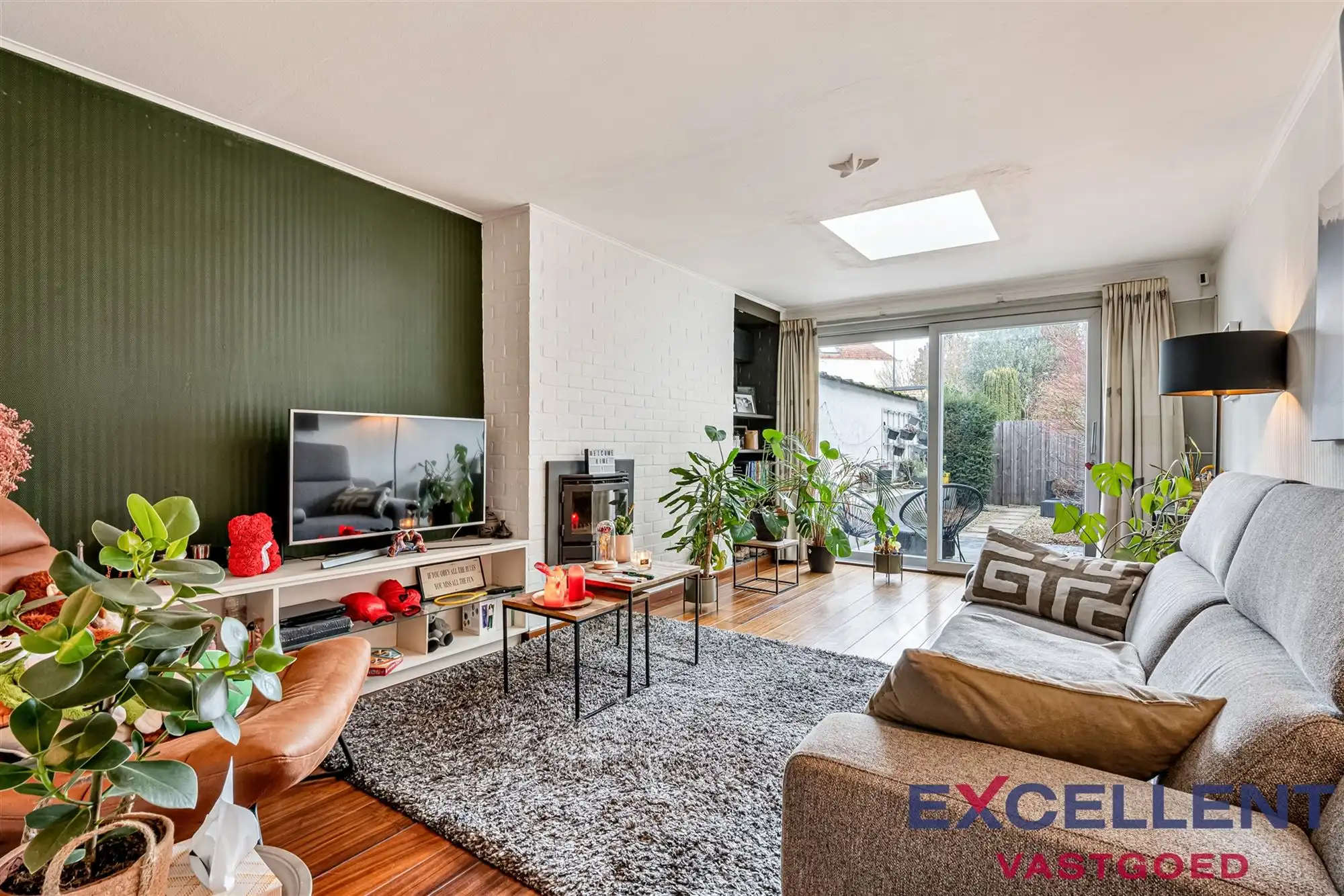 Hoofdfoto van de publicatie: Instapklare woning met stadstuin en parking in Sint-Denijs-Westrem