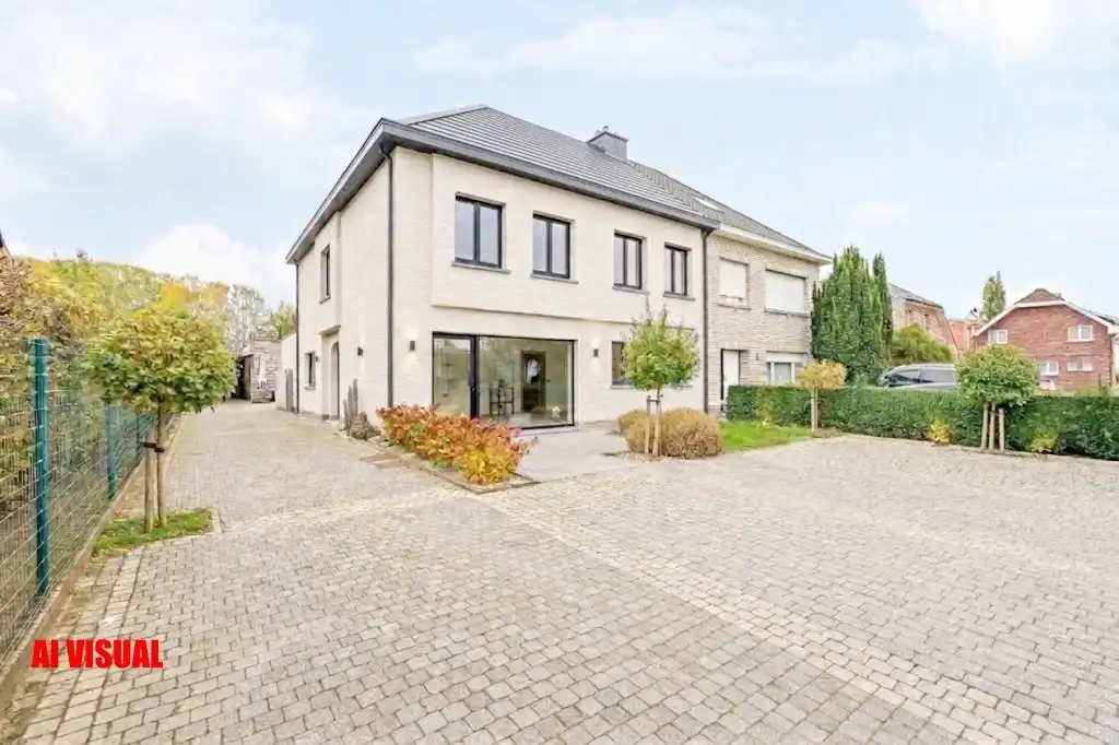Veelzijdig (handels)huis met atelier, magazijn en zalige tuin op 1.400 m² te Meldert foto 3