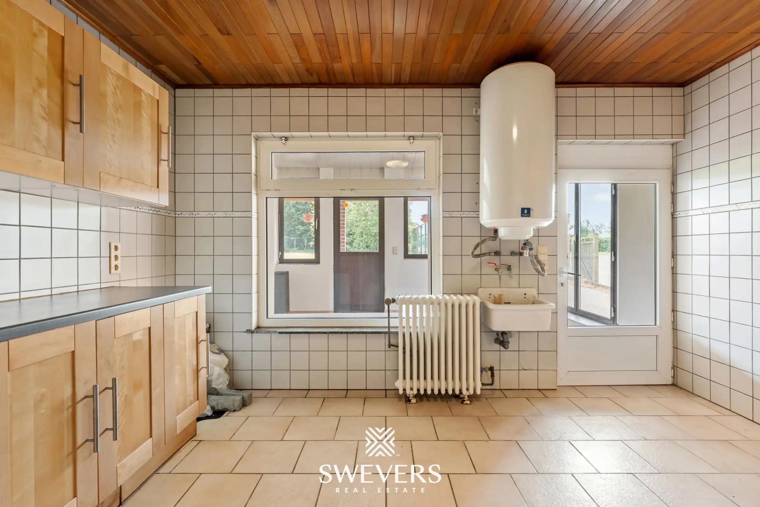 Charmante open bebouwing met 3 slaapkamers, zonnige tuin en renovatiepotentieel foto 15