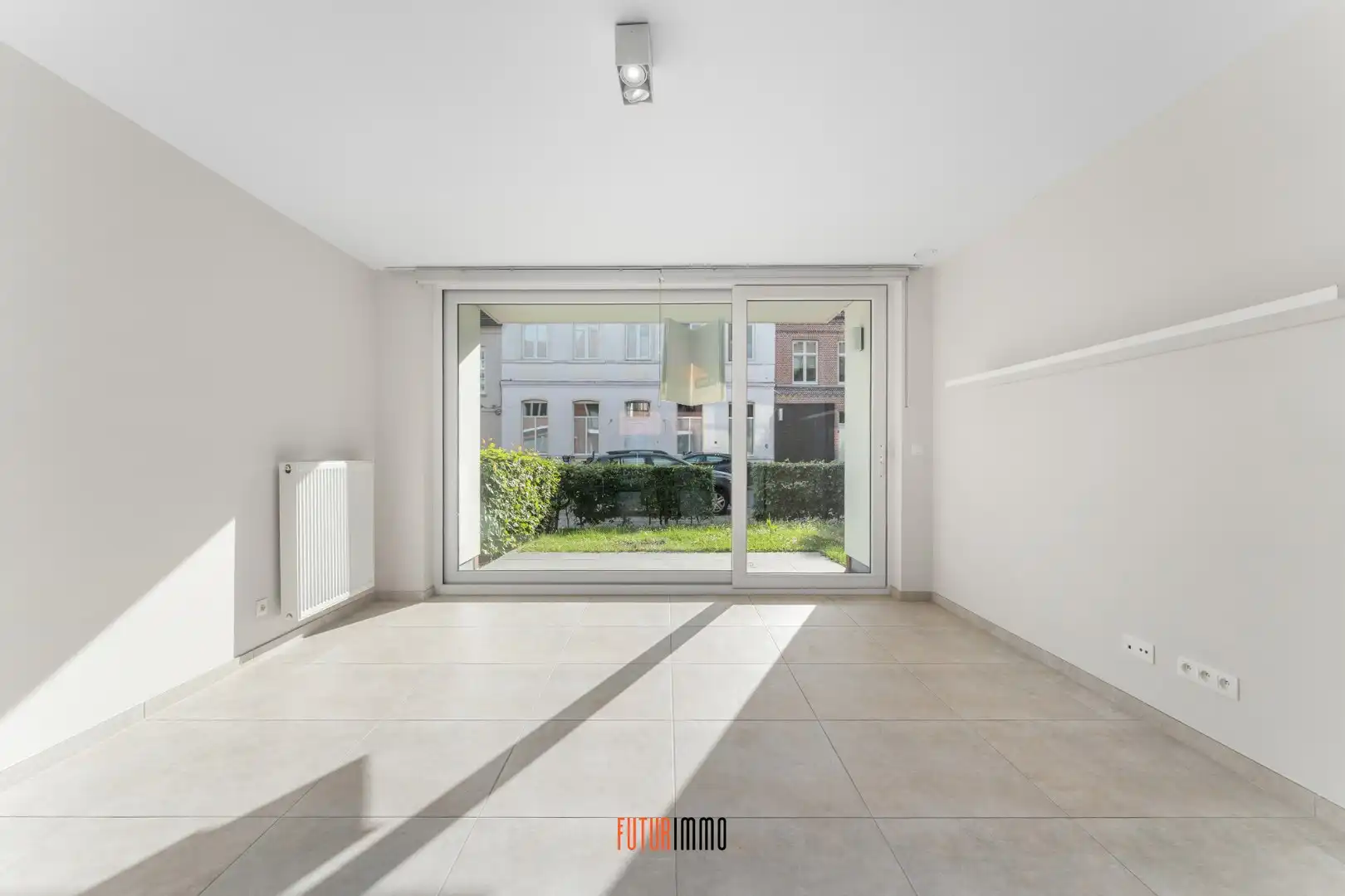 Lichtrijk gelijkvloersappartement met tuintje te Brugge foto 5