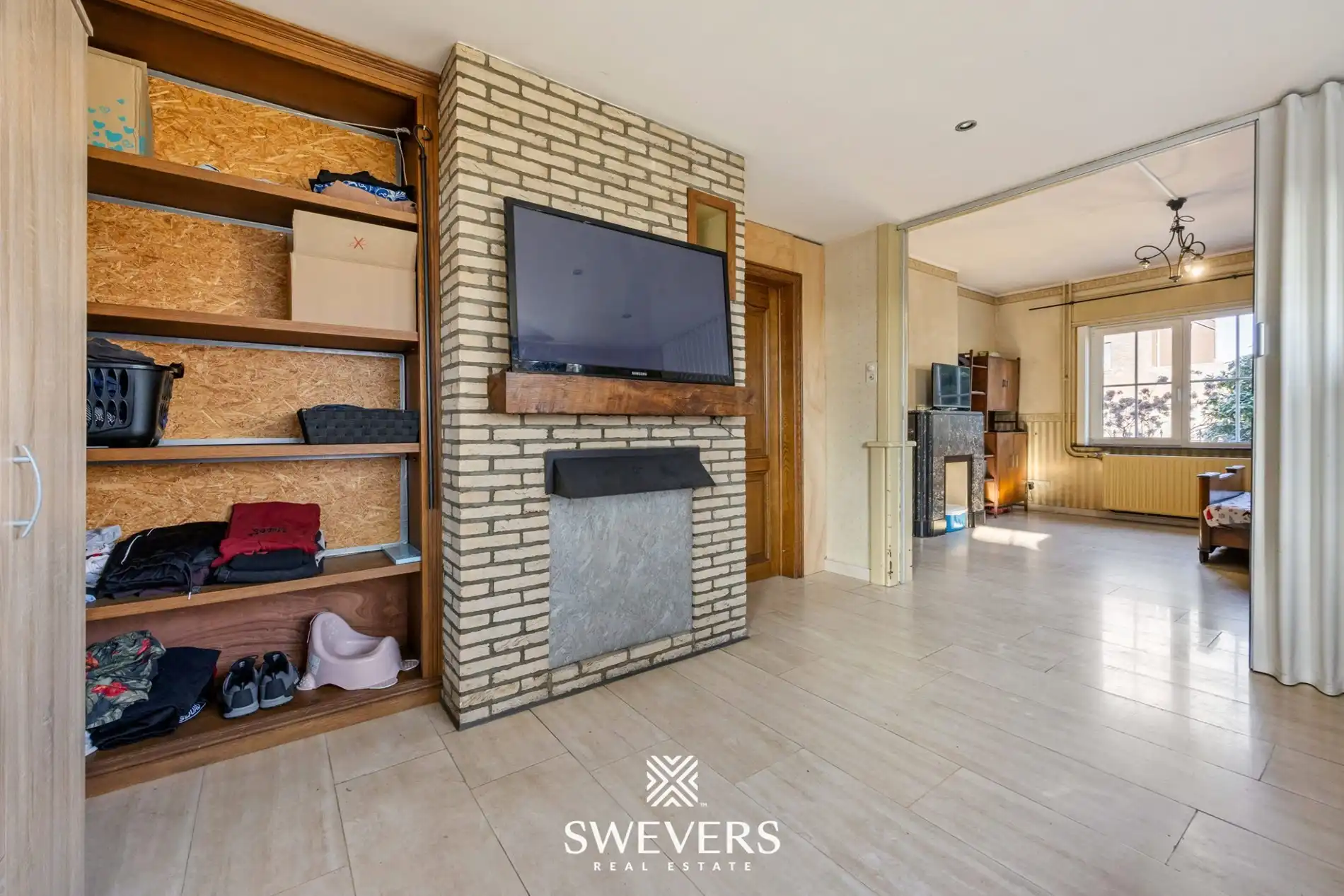 Te renoveren open bebouwing met ruime volumes en zuidgericht perceel in Heusden   foto 5
