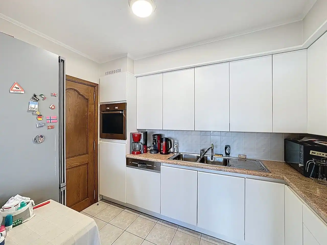 Ruim en functioneel appartement met drie slaapkamers vlakbij het Vissershuldeplein te Heist foto 9