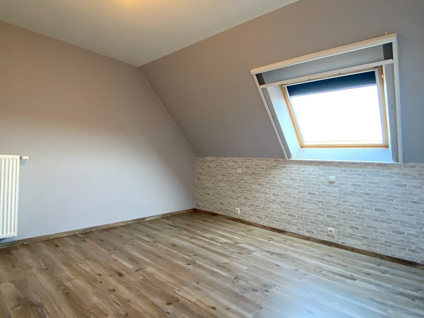 Kindvriendelijke en lichtrijke woning te huur in Wevelgem foto 7