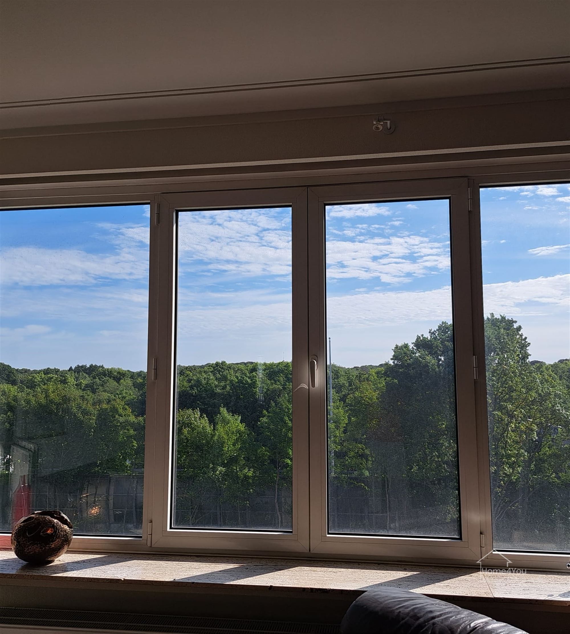 Licht en ruim appartement met uitzicht op het Rivierenhof foto 5