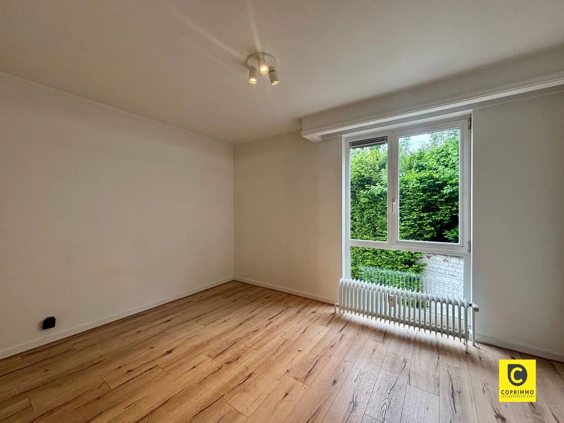 Instapklaar 3 slaapkamer appartement met zonnig terras, kelder en fietsenberging foto 23