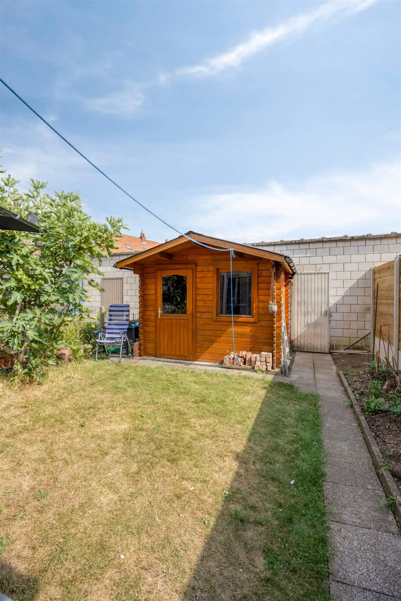 Volledig gerenoveerde 4-slpk woning met garagebox foto 30