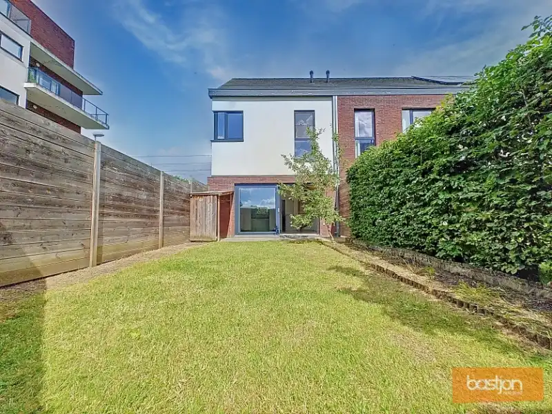 Energiezuinige woning met tuin (EPC A) te Kortrijk foto 10