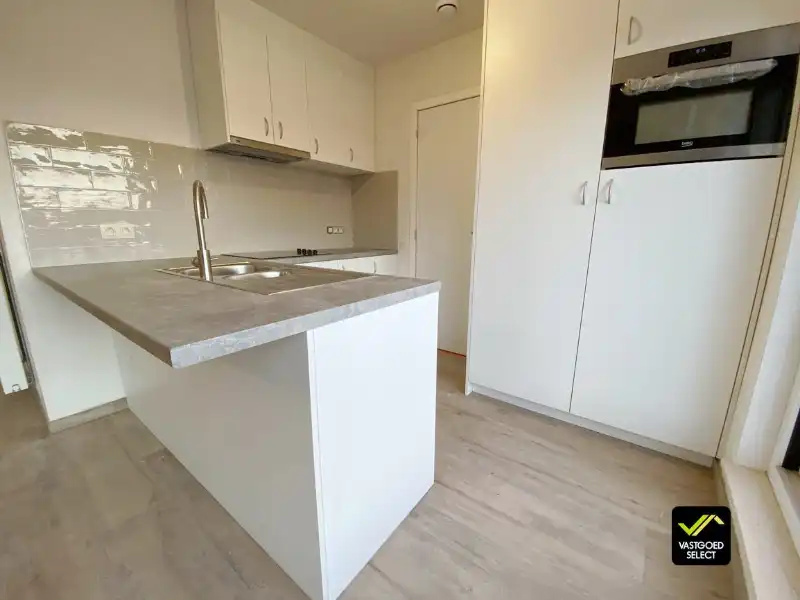Te huur: Ruim en modern appartement in rustige omgeving te Adegem foto 4