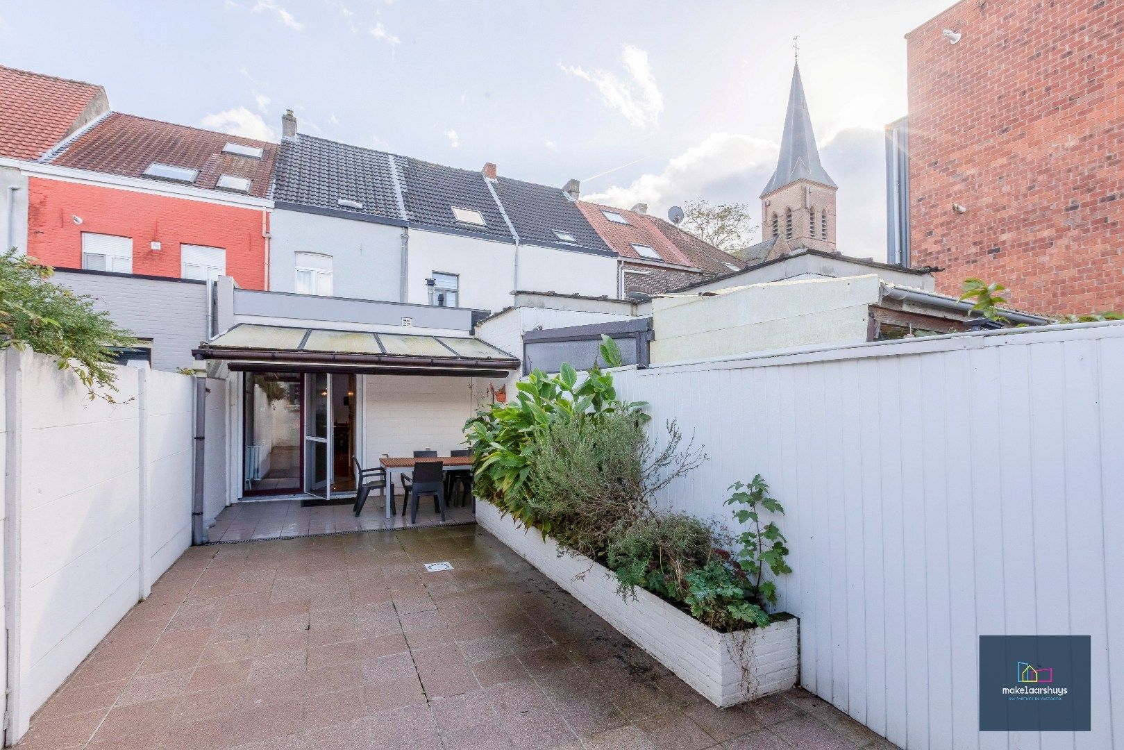 Charmante op te frissen rijwoning met ruime stadstuin  foto 18