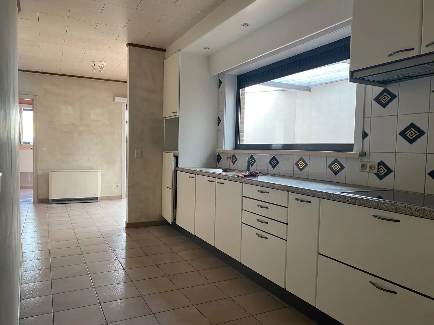 Charmante rijwoning met 2 slpk en koer foto 4