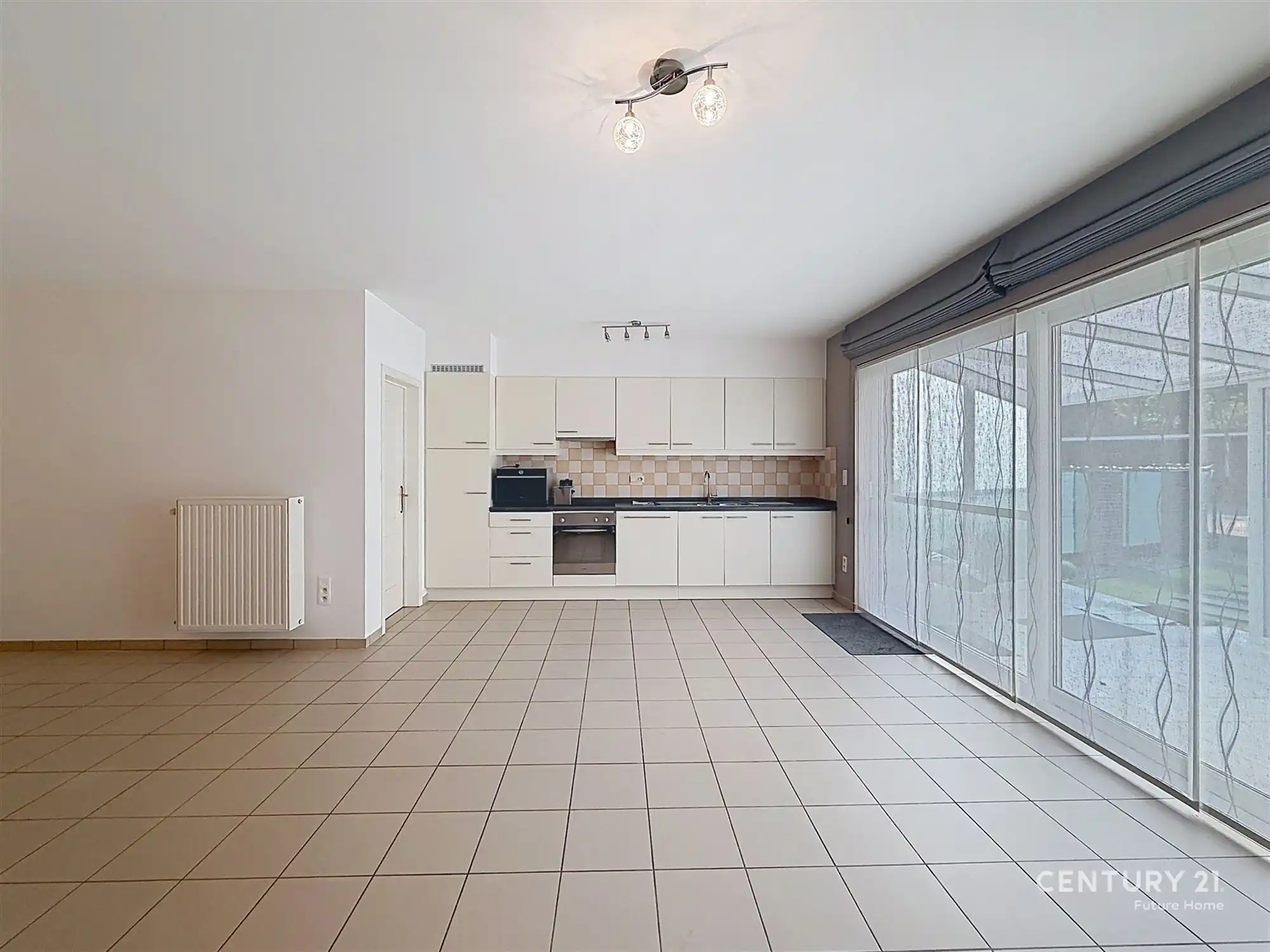 Gelijkvloers appartement met overdekt terras en tuin! foto 3