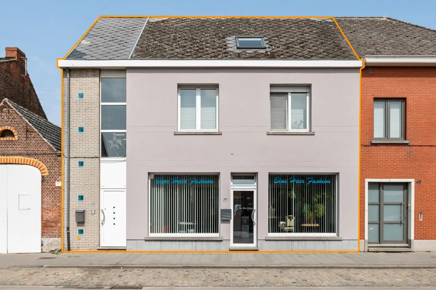 Praktijkruimte/winkel met bovenliggend duplex-appartement in het centrum van Berendrecht foto 2