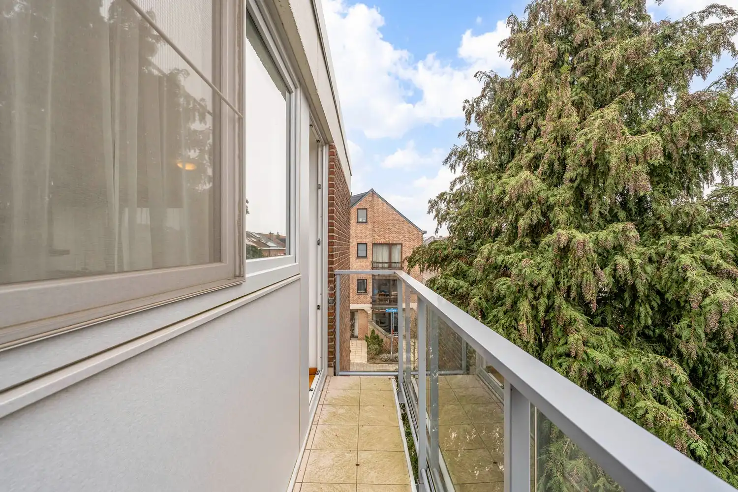 Goed gelegen en lichtrijk appartement met 2 slaapkamers, 2 terrassen en een garagebox te Kessel-Lo! foto 9