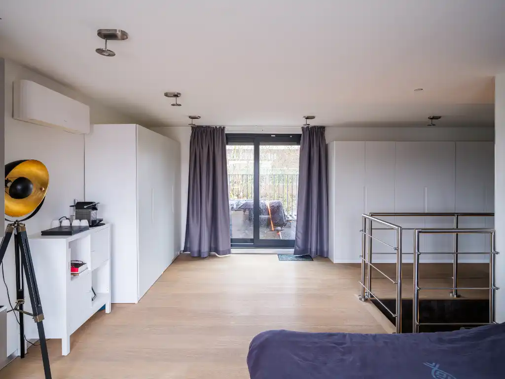 Ruim en lichtrijk duplexappartement met 2 slaapkamers, meerdere terrassen en staanplaats aan Ter Platen foto 18