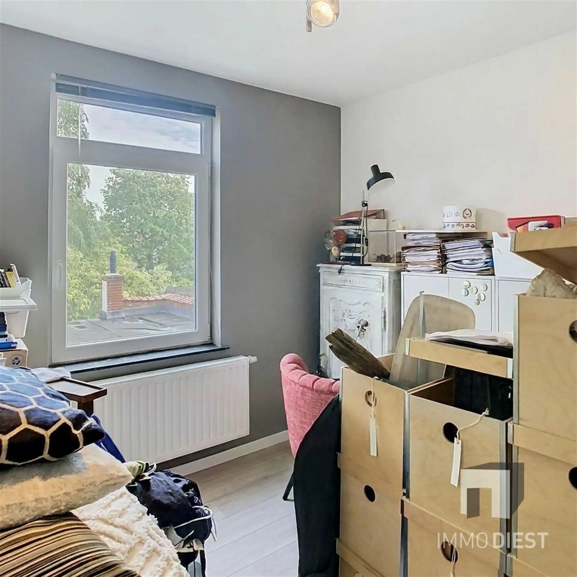 Knappe rijwoning met tuin en terras foto 19