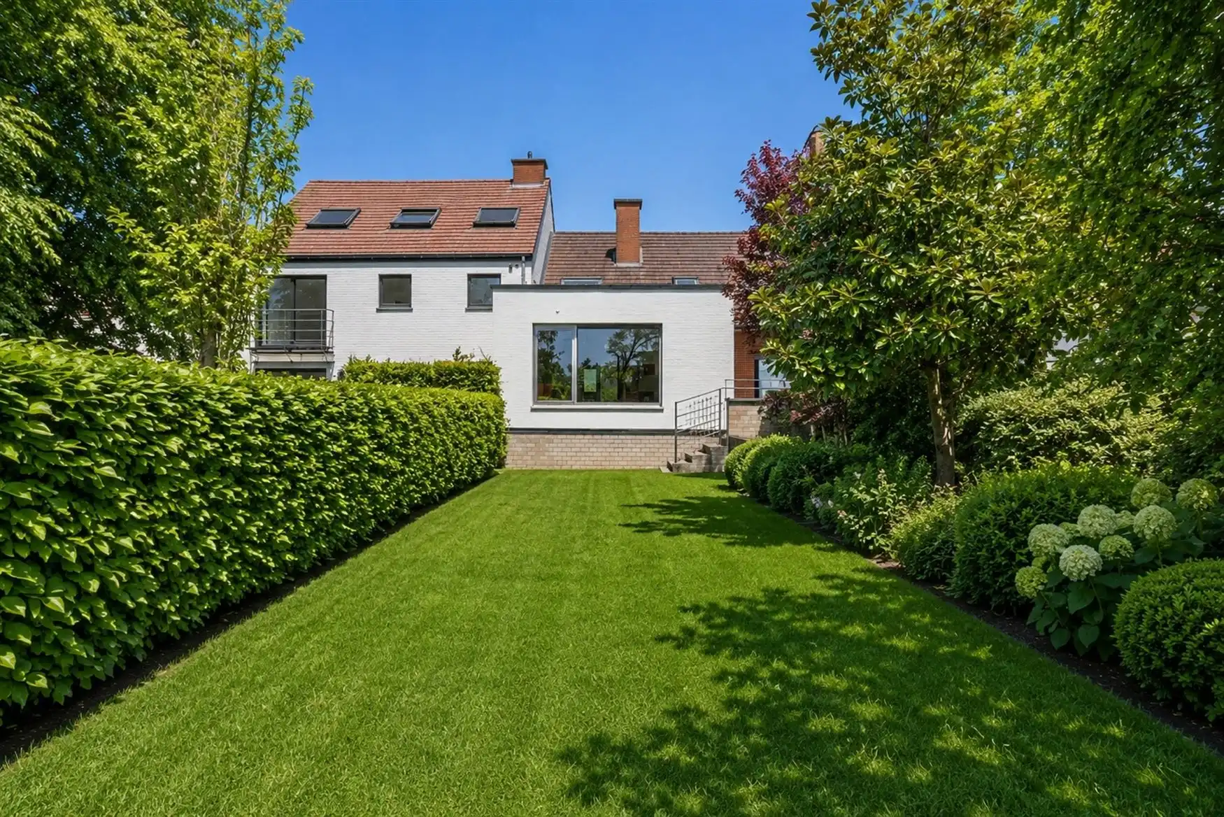 Ruime woning met zuidgerichte tuin en open zicht. foto 17