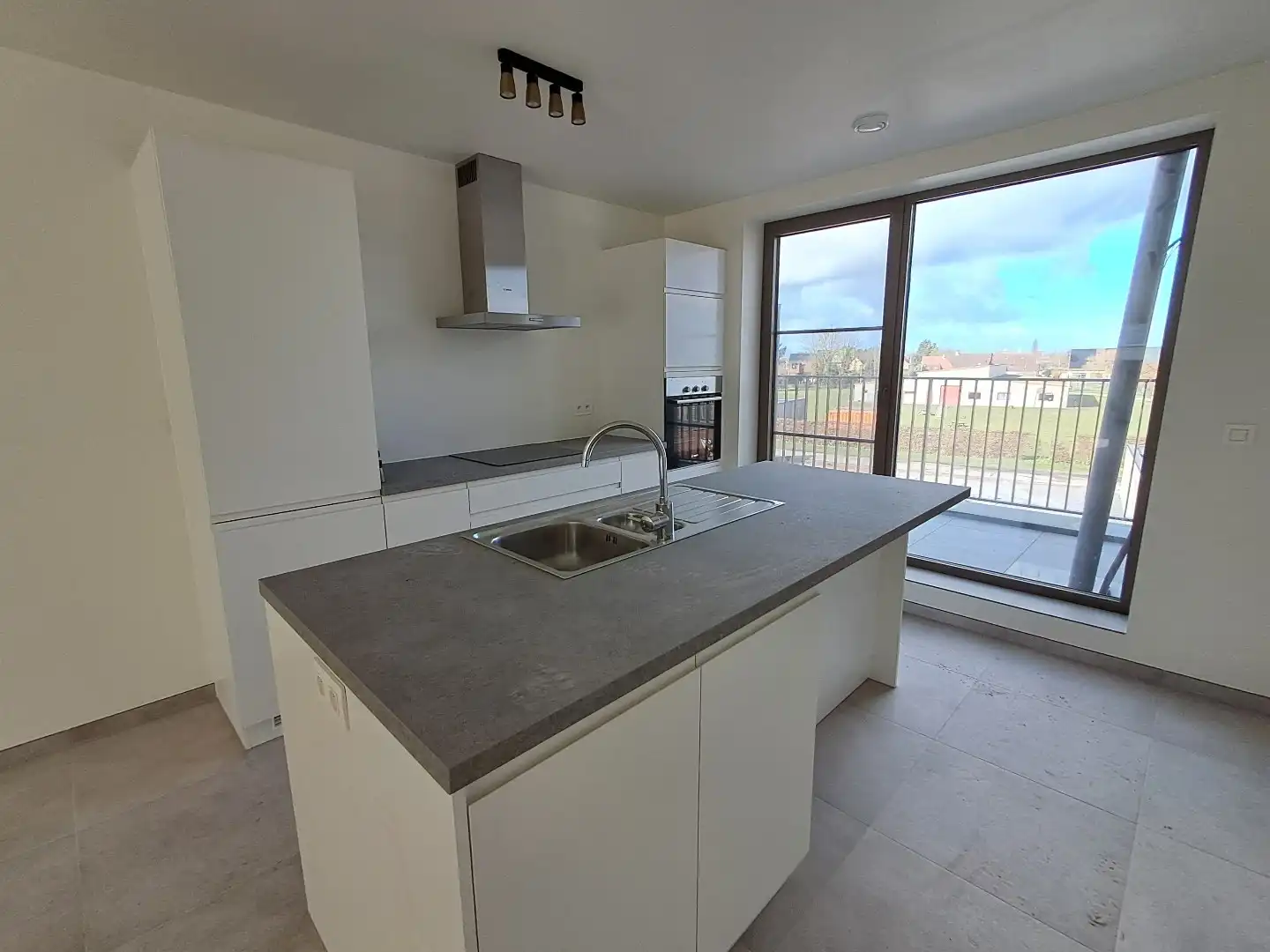 Ruim nieuwbouwappartement te Sijsele! foto 2