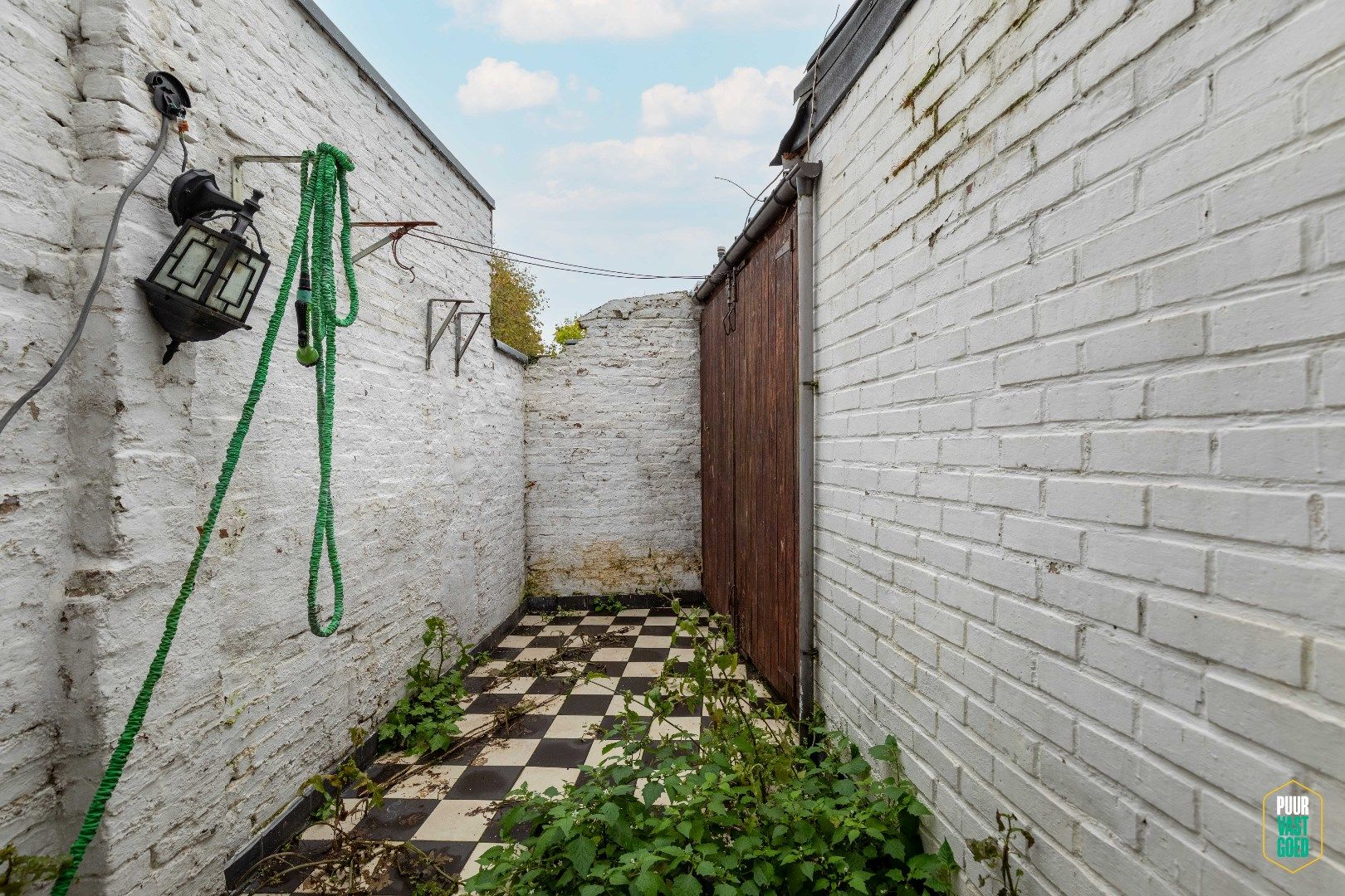 Te vernieuwen woning met zonnig stadsterras in super hartje Brugge. foto 13