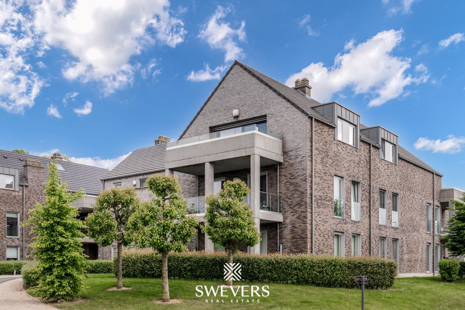 Exclusief wonen in een lichtrijke penthouse te Wellen foto {{pictureIndex}}
