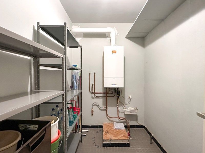 Instapklaar appartement met twee slaapkamers, terras en optionele garagebox in Sint-Niklaas foto 8
