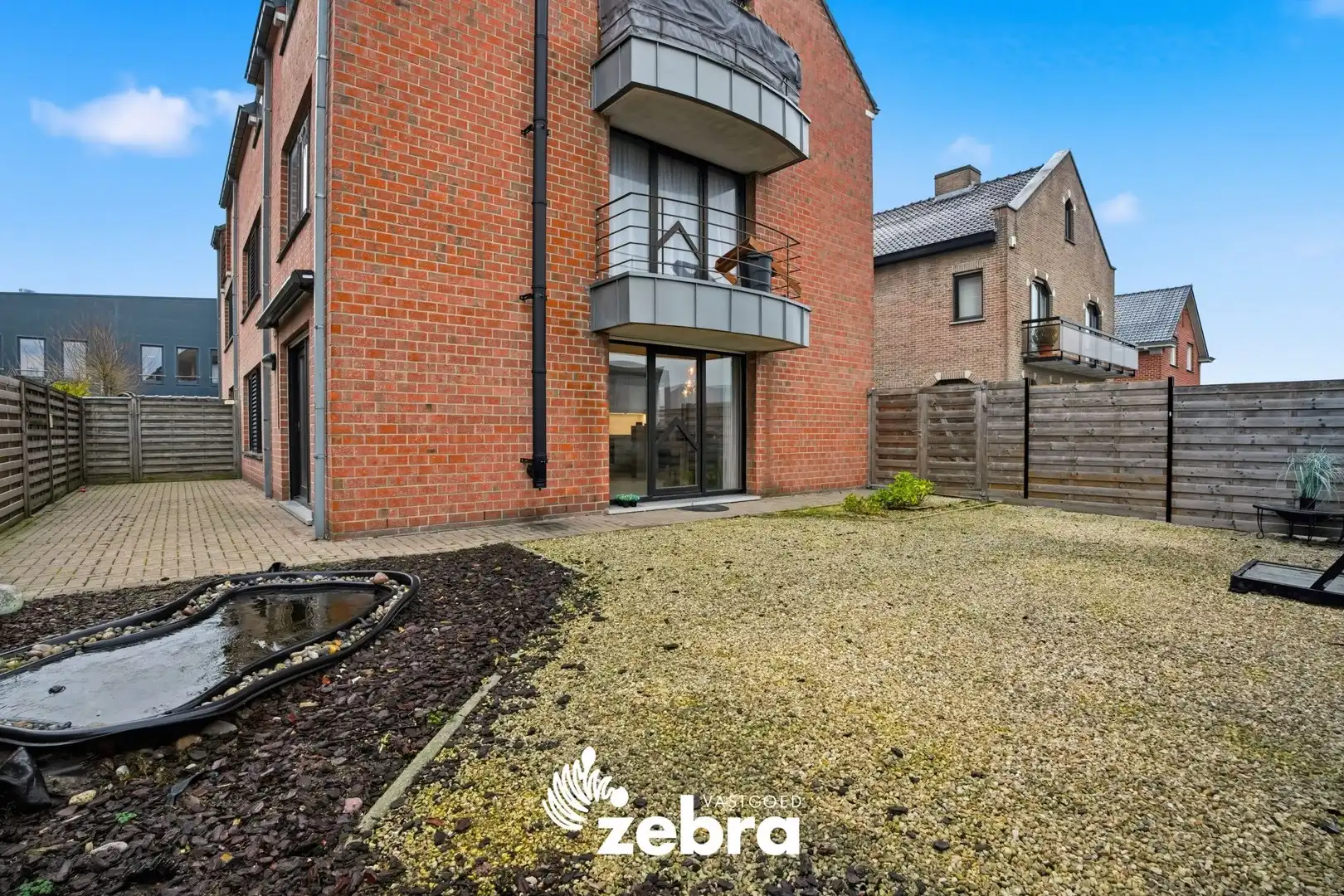 Instapklaar gelijkvloers appartement met tuin van 116 m² en garage! foto 15