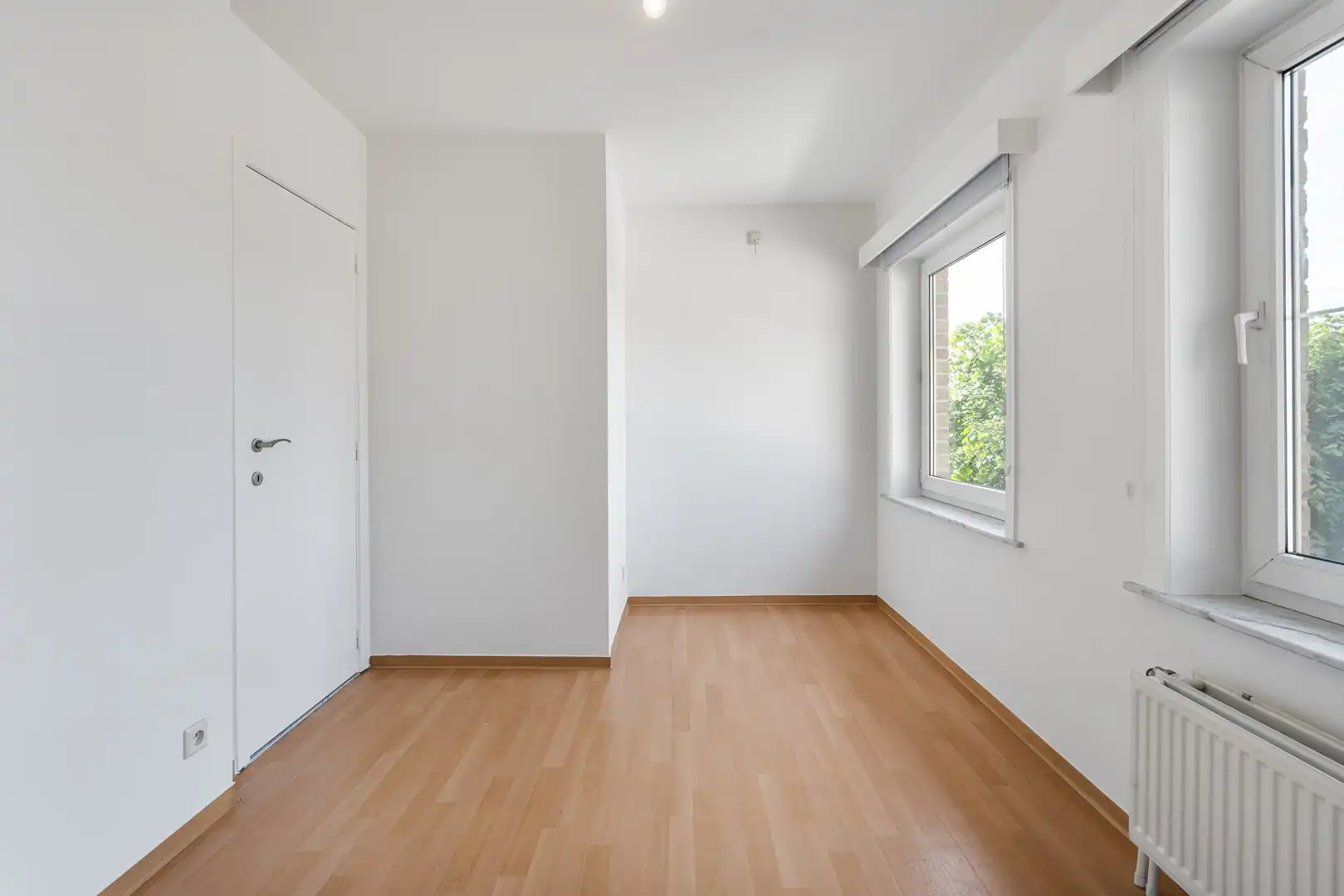 Instapklaar appartement met garagebox aan de markt van Olsene foto 13