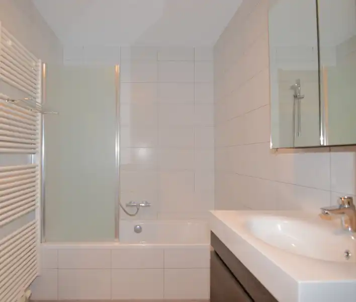 Gemeubeld gelijkvloers appartement met tuin – Heffen foto 11
