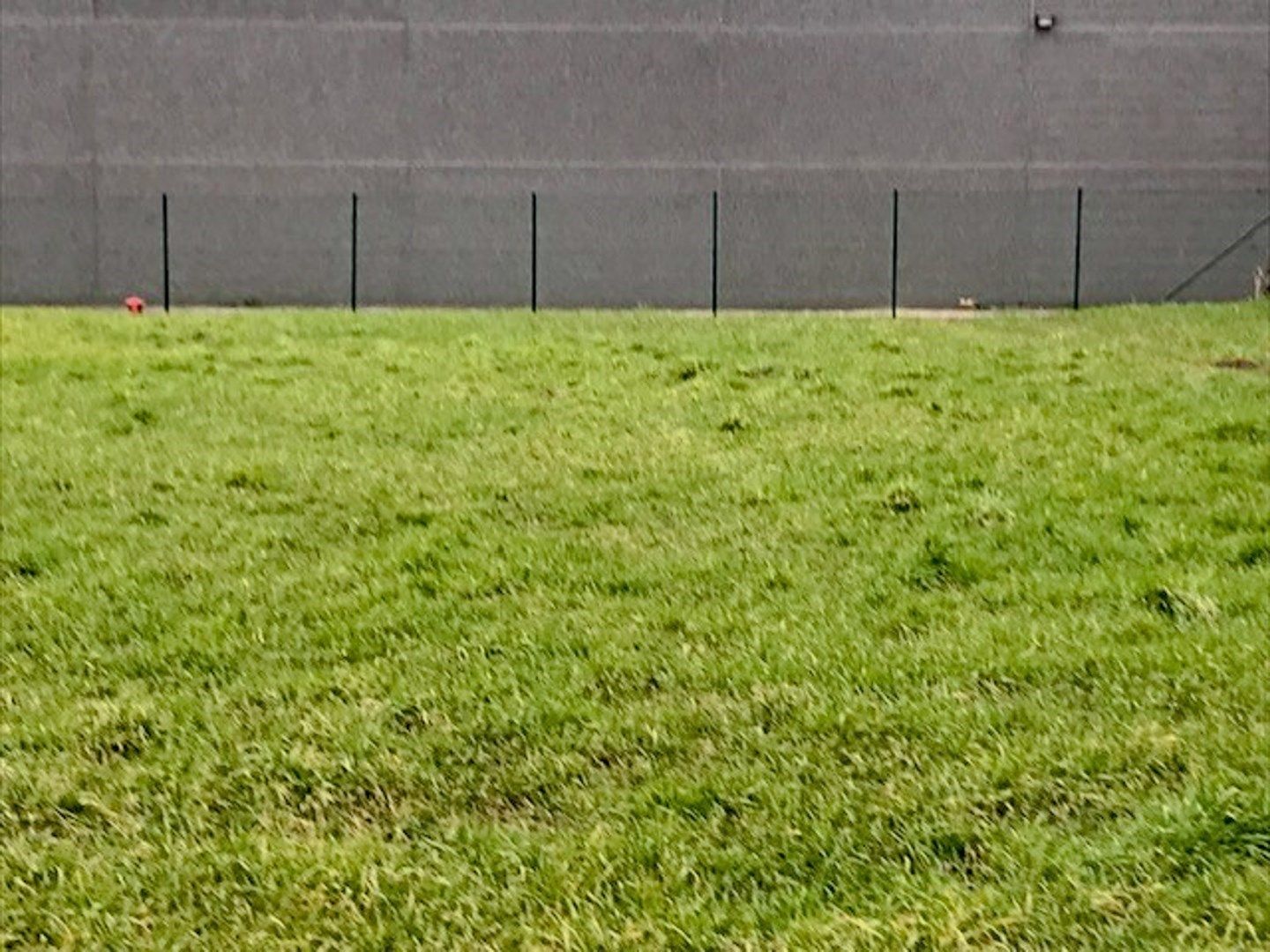 Residentieel gelegen stuk bouwgrond van 1500m² met aanpalend stuk groenzone van 1000m² foto 3