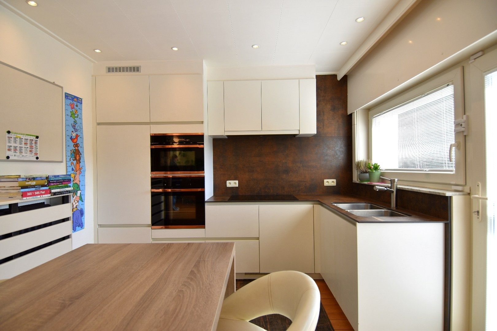 Vrijstaande woning met 3 slaapkamers, garage en tuin te koop in Wevelgem foto 4